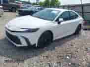 2025 Toyota Camry SE with VIN 4T1DAACKXSU083204, listed as a IAAI auction lot 43116221 with 859 mi miles and . Bid and sale history available at DreamBid. Image 2.