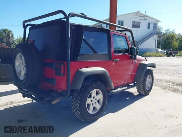2011 Jeep Wrangler Sport с VIN 1J4AA2D15BL519640, выставлен на аукционе IAAI как лот 43444019 с пробегом 186 663 миль миль и . История ставок и продаж доступна на DreamBid. Изображение 4.