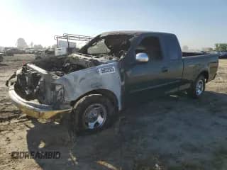 2000 Ford F-150 XL с VIN 1FTZX1720YKA53930, выставлен на аукционе Copart как лот 56052925 с пробегом Не указан миль и Списание • Salvage title. История ставок и продаж доступна на DreamBid. Изображение 1.