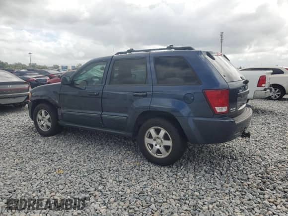 2009 Jeep Grand Cherokee Laredo with VIN 1J8GR48K79C509461, listed as a Copart auction lot 85326715 with 178,870 mi miles and Salvage title. Bid and sale history available at DreamBid. Image 2.