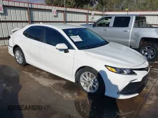 2021 Toyota Camry LE with VIN 4T1C11AKXMU406376, listed as a IAAI auction lot 43445870 with 28,448 mi miles and . Bid and sale history available at DreamBid. Image 1.