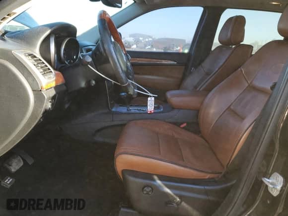 2012 Jeep Grand Cherokee Overland Summit z VIN 1C4RJFCT7CC156309, wystawiony jako Copart lot #86177895 z przebiegiem 138 200 mil mil oraz Szkoda całkowita • Salvage title. Historia ofert i sprzedaży dostępna na DreamBid. Obrazek 7.