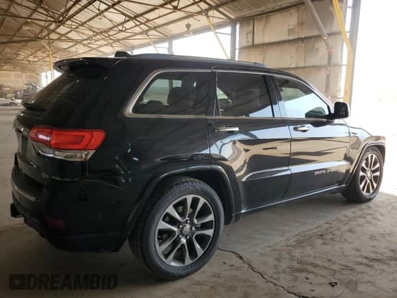 2018 Jeep Grand Cherokee Overland with VIN 1C4RJFCTXJC453250, listed as a Copart auction lot 64644784 with 194,353 mi miles and Salvage title. Bid and sale history available at DreamBid. Image 3.