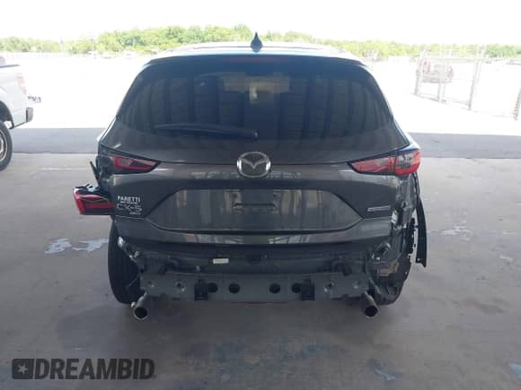 2023 Mazda CX-5 S Carbon Edition z VIN JM3KFBCM8P0251108, wystawiony jako IAAI lot #42171155 z przebiegiem 45 551 mil mil oraz . Historia ofert i sprzedaży dostępna na DreamBid. Obrazek 17.