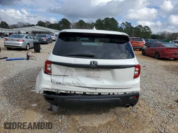 2021 Honda Passport EX-L с VIN 5FNYF7H52MB012779, выставлен на аукционе Copart как лот 44070215 с пробегом 66 836 миль миль и Списание • Salvage title. История ставок и продаж доступна на DreamBid. Изображение 6.