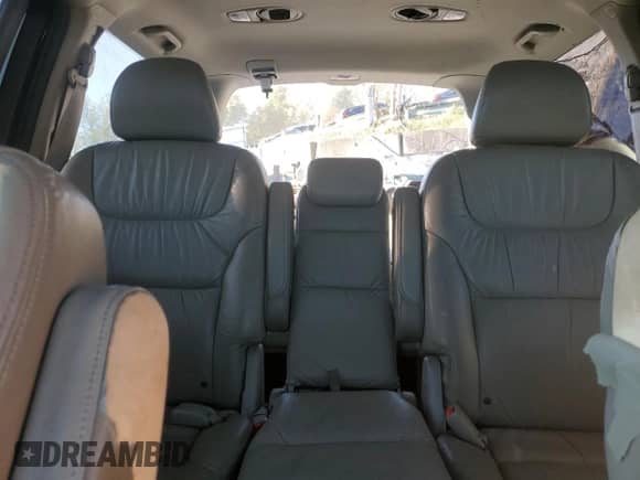 2007 Honda Odyssey EX-L z VIN 5FNRL38627B451239, wystawiony jako Copart lot #82254835 z przebiegiem 174 201 mil mil oraz Szkoda całkowita • Salvage title. Historia ofert i sprzedaży dostępna na DreamBid. Obrazek 10.