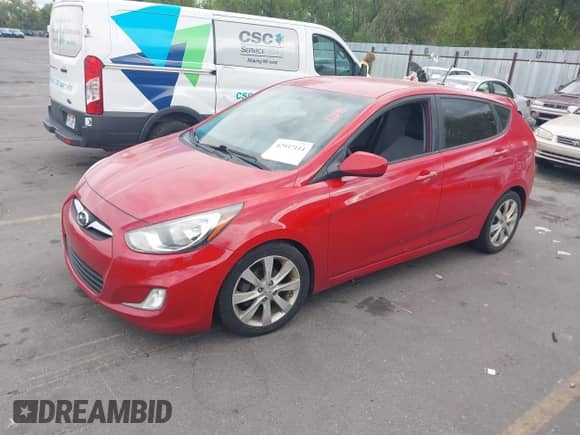 2012 Hyundai Accent SE with VIN KMHCU5AEXCU018071, listed as a IAAI auction lot 42937114 with 197,223 mi miles and . Bid and sale history available at DreamBid. Image 2.