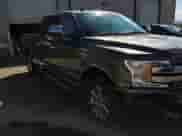 2019 Ford F-150 Lariat with VIN 1FTFW1E40KFD53543, listed as a Copart auction lot 80527525 with 207,442 mi miles and Salvage title. Bid and sale history available at DreamBid. Image 13.