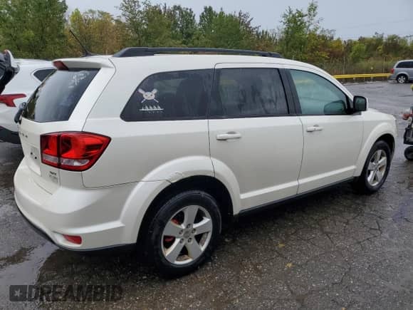 2012 Dodge Journey SXT z VIN 3C4PDDBG1CT315997, wystawiony jako Copart lot #82042085 z przebiegiem 146 413 mil mil oraz Czysty tytuł • Clean title. Historia ofert i sprzedaży dostępna na DreamBid. Obrazek 3.