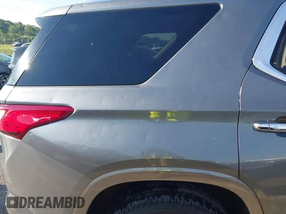 2021 Chevrolet Traverse Premier with VIN 1GNEVKKW1MJ199524, listed as a IAAI auction lot 42365345 with 120,806 mi miles and . Bid and sale history available at DreamBid. Image 6.