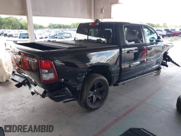 2020 Ram 1500 Big Horn z VIN 1C6RREFT0LN373453, wystawiony jako IAAI lot #42589862 z przebiegiem 93 768 mil mil oraz . Historia ofert i sprzedaży dostępna na DreamBid. Obrazek 4.