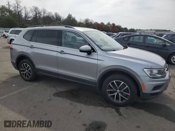 2021 Volkswagen Tiguan SE с VIN 3VV2B7AX7MM118770, выставлен на аукционе Copart как лот 82082155 с пробегом 80 787 миль миль и Списание • Salvage title. История ставок и продаж доступна на DreamBid. Изображение 4.