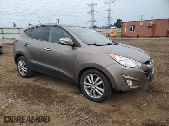 2010 Hyundai Tucson Limited с VIN KM8JU3AC1AU057056, выставлен на аукционе Copart как лот 66630115 с пробегом 117 910 миль миль и Списание • Salvage title. История ставок и продаж доступна на DreamBid. Изображение 4.
