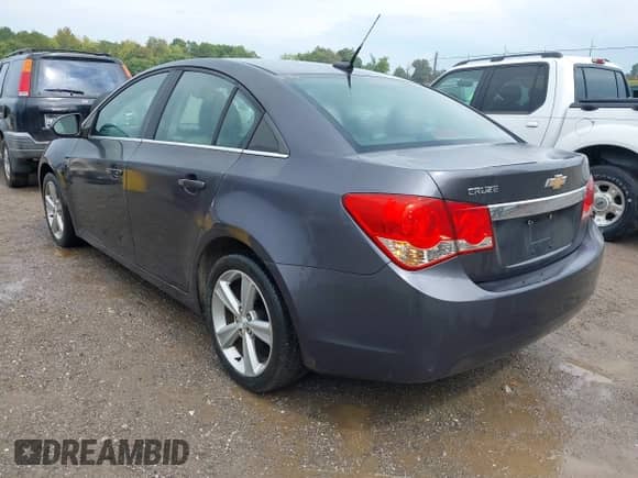 2011 Chevrolet Cruze LS z VIN 1G1PC5SH9B7224313, wystawiony jako IAAI lot #43259364 z przebiegiem 156 835 mil mil oraz . Historia ofert i sprzedaży dostępna na DreamBid. Obrazek 3.