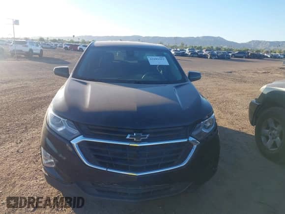 2021 Chevrolet Equinox LT z VIN 3GNAXKEV2ML401632, wystawiony jako IAAI lot #43182422 z przebiegiem 59 429 mil mil oraz . Historia ofert i sprzedaży dostępna na DreamBid. Obrazek 12.