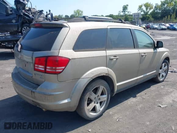 2009 Dodge Journey SXT z VIN 3D4GH57V59T583240, wystawiony jako IAAI lot #43179977 z przebiegiem 151 070 mil mil oraz . Historia ofert i sprzedaży dostępna na DreamBid. Obrazek 4.