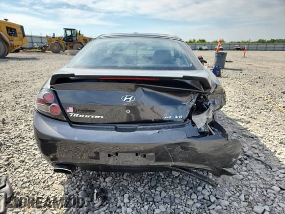 2007 Hyundai Tiburon GT с VIN KMHHN66F37U262161, выставлен на аукционе Copart как лот 80673555 с пробегом 127 895 миль миль и На запчасти • Non repairable. История ставок и продаж доступна на DreamBid. Изображение 6.