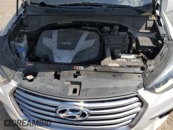 2018 Hyundai Santa Fe SE с VIN KM8SN4HF9JU263975, выставлен на аукционе Copart как лот 71532845 с пробегом 103 400 миль миль и Списание • Salvage title. История ставок и продаж доступна на DreamBid. Изображение 12.