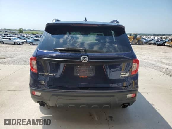 2019 Honda Passport Touring z VIN 5FNYF8H91KB014948, wystawiony jako Copart lot #68904135 z przebiegiem 69 223 mil mil oraz Szkoda całkowita • Salvage title. Historia ofert i sprzedaży dostępna na DreamBid. Obrazek 6.