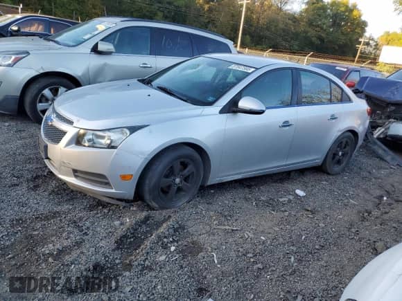 2013 Chevrolet Cruze LT with VIN 1G1PK5SB5D7289144, listed as a Copart auction lot 87047565 with 149,596 mi miles and Salvage title. Bid and sale history available at DreamBid. Image 1.