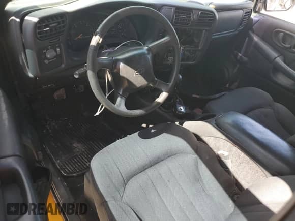 2003 Chevrolet Blazer Xtreme with VIN 1GNCS18X43K122598, listed as a Copart auction lot 60645075 with Not provided miles and Salvage title. Bid and sale history available at DreamBid. Image 8.