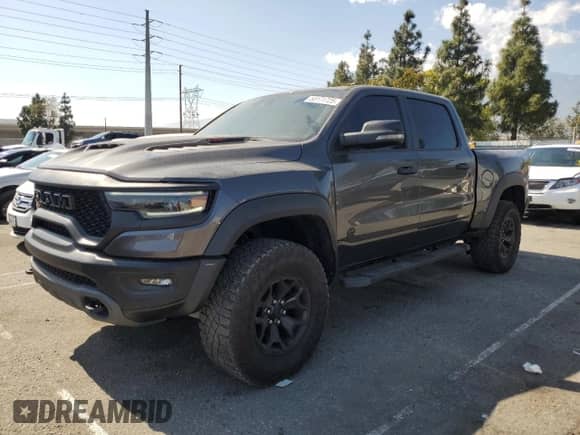 2023 Ram 1500 TRX z VIN 1C6SRFU90PN558994, wystawiony jako Copart lot #55171725 z przebiegiem 17 350 mil mil oraz Szkoda całkowita • Salvage title. Historia ofert i sprzedaży dostępna na DreamBid. Obrazek 1.