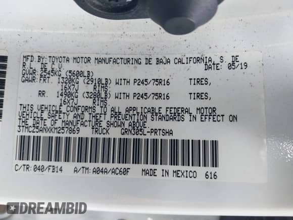 2019 Toyota Tacoma SR with VIN 3TMCZ5ANXKM257869, listed as a IAAI auction lot 41715668 with 99,452 mi miles and . Bid and sale history available at DreamBid. Image 9.