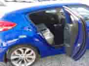 2012 Hyundai Veloster w/Black Int z VIN KMHTC6ADXCU064435, wystawiony jako IAAI lot #43200428 z przebiegiem 49 230 mil mil oraz . Historia ofert i sprzedaży dostępna na DreamBid. Obrazek 8.