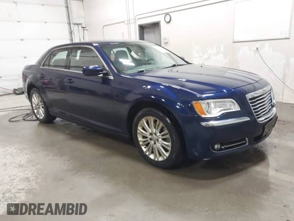 2013 Chrysler 300 with VIN 2C3CCARG9DH614125, listed as a IAAI auction lot 42227211 with 134,856 mi miles and . Bid and sale history available at DreamBid. Image 1.
