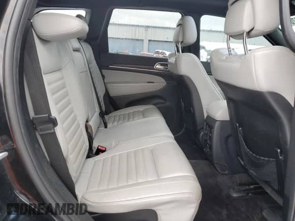 2018 Jeep Grand Cherokee Sterling with VIN 1C4RJFBT5JC121010, listed as a Copart auction lot 84887054 with 96,528 mi miles and Salvage title. Bid and sale history available at DreamBid. Image 11.