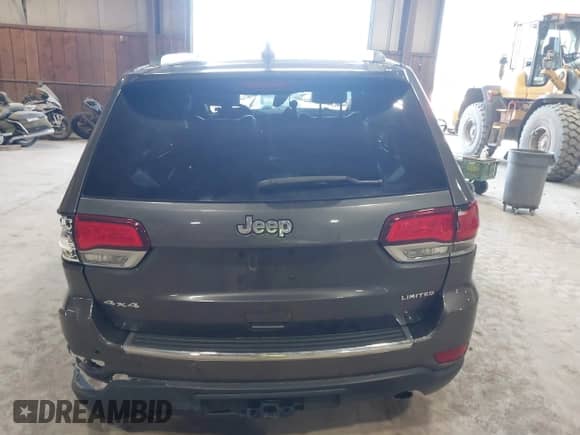 2021 Jeep Grand Cherokee 80th Anniversary with VIN 1C4RJFBG8MC503264, listed as a IAAI auction lot 41918873 with 100,796 mi miles and . Bid and sale history available at DreamBid. Image 16.