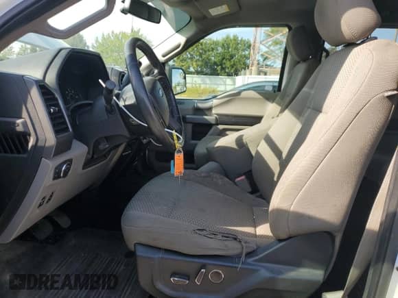 2018 Ford F-150 XL with VIN 1FTEW1E58JFE75389, listed as a Copart auction lot 70952815 with 109,135 mi miles and Salvage title. Bid and sale history available at DreamBid. Image 7.