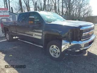 2017 Chevrolet Silverado 2500HD Work Truck z VIN 1GC1KUEG0HF219674, wystawiony jako IAAI lot #41883430 z przebiegiem 94 113 mil mil oraz . Historia ofert i sprzedaży dostępna na DreamBid. Obrazek 1.