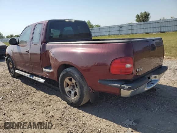 1999 Ford F-150 XL z VIN 1FTZX0729XKB51749, wystawiony jako Copart lot #75480674 z przebiegiem Nie podano mil oraz Szkoda całkowita • Salvage title. Historia ofert i sprzedaży dostępna na DreamBid. Obrazek 2.