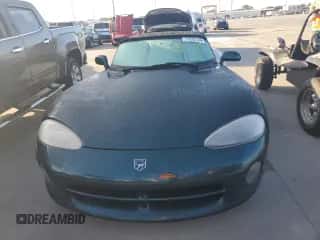 1995 Dodge Viper with VIN 1B3BR65E9SV201019, listed as a Copart auction lot 77252124 with Not provided miles and Non repairable. Bid and sale history available at DreamBid. Image 5.