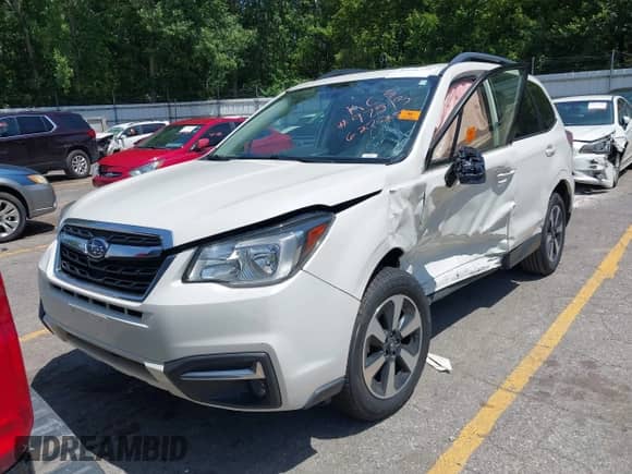 2018 Subaru Forester Premium z VIN JF2SJAGC9JH465554, wystawiony jako IAAI lot #42656773 z przebiegiem Nie podano mil oraz . Historia ofert i sprzedaży dostępna na DreamBid. Obrazek 11.