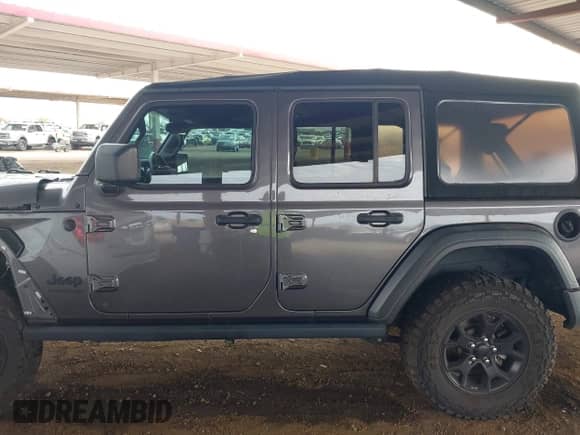 2021 Jeep Wrangler Unlimited Willys with VIN 1C4HJXDN3MW563173, listed as a IAAI auction lot 43073511 with 45,061 mi miles and . Bid and sale history available at DreamBid. Image 14.