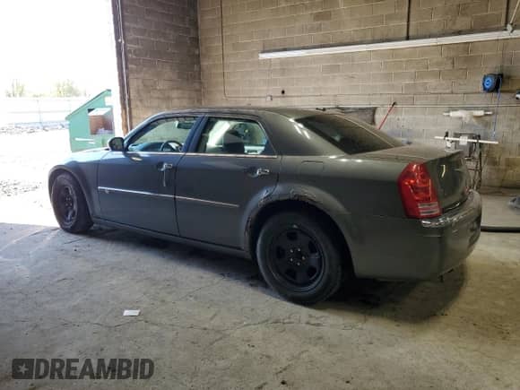 2009 Chrysler 300 C Hemi with VIN 2C3LA63T49H625209, listed as a Copart auction lot 90025255 with 93,385 mi miles and Salvage title. Bid and sale history available at DreamBid. Image 2.