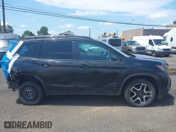2023 Honda Passport Elite z VIN 5FNYF8H01PB030270, wystawiony jako IAAI lot #42667744 z przebiegiem 7 931 mil mil oraz . Historia ofert i sprzedaży dostępna na DreamBid. Obrazek 13.