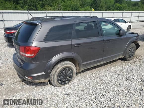 2017 Dodge Journey SXT with VIN 3C4PDDBG3HT618254, listed as a Copart auction lot 64763265 with 118,756 mi miles and Salvage title. Bid and sale history available at DreamBid. Image 3.