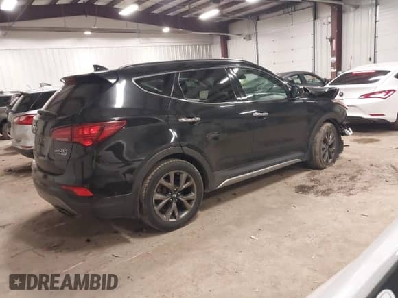 2018 Hyundai Santa Fe Ultimate с VIN 5XYZWDLA6JG518207, выставлен на аукционе IAAI как лот 41690166 с пробегом 101 603 миль миль и . История ставок и продаж доступна на DreamBid. Изображение 4.