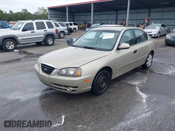 2005 Hyundai Elantra GLS with VIN KMHDN46D15U198250, listed as a IAAI auction lot 43433653 with 271,046 mi miles and . Bid and sale history available at DreamBid. Image 2.