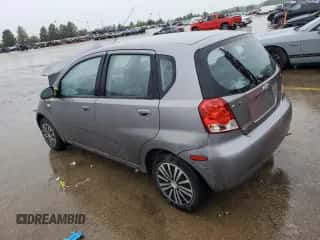 2007 Chevrolet Aveo LS z VIN KL1TD66607B738726, wystawiony jako Copart lot #73238484 z przebiegiem Nie podano mil oraz Szkoda całkowita • Salvage title. Historia ofert i sprzedaży dostępna na DreamBid. Obrazek 2.