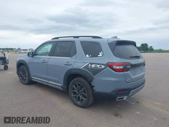 2023 Honda Pilot Elite с VIN 5FNYG1H82PB034130, выставлен на аукционе IAAI как лот 42791889 с пробегом 7 711 миль миль и . История ставок и продаж доступна на DreamBid. Изображение 3.