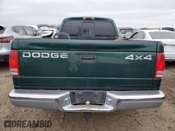 1998 Dodge Dakota SLT z VIN 1B7GG22Y0WS663798, wystawiony jako Copart lot #44569915 z przebiegiem Nie podano mil oraz Szkoda całkowita • Salvage title. Historia ofert i sprzedaży dostępna na DreamBid. Obrazek 6.