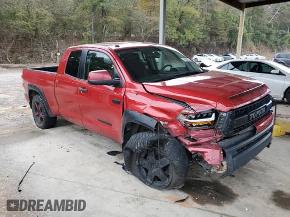 2017 Toyota Tundra SR with VIN 5TFUW5F16HX635935, listed as a Copart auction lot 82652525 with 277,111 mi miles and Salvage title. Bid and sale history available at DreamBid. Image 4.