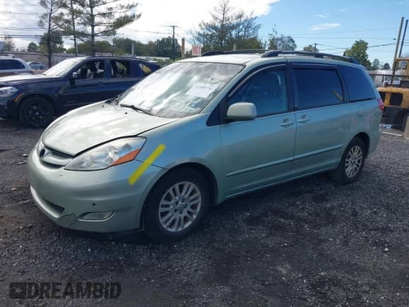 2009 Toyota Sienna XLE with VIN 5TDZK22C39S264912, listed as a IAAI auction lot 43385734 with 327,786 mi miles and . Bid and sale history available at DreamBid. Image 2.
