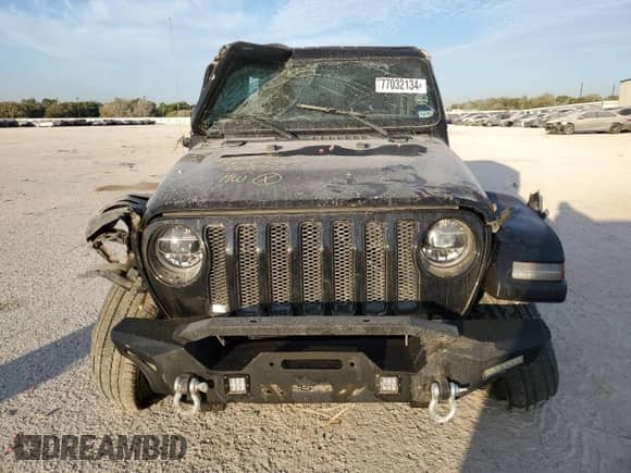 2021 Jeep Wrangler Unlimited Sahara High Altitude with VIN 1C4HJXEM0MW669053, listed as a Copart auction lot 77032134 with 41,133 mi miles and Salvage title. Bid and sale history available at DreamBid. Image 5.