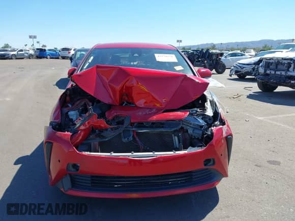 2021 Toyota Prius L Eco with VIN JTDKAMFU6M3152201, listed as a IAAI auction lot 43278670 with 144,414 mi miles and . Bid and sale history available at DreamBid. Image 12.