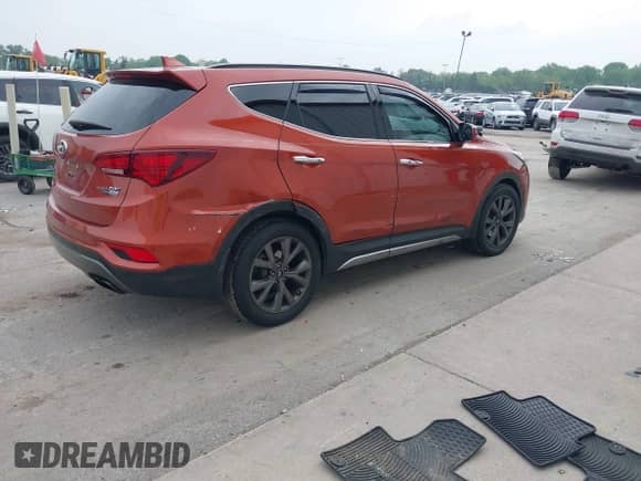 2018 Hyundai Santa Fe Ultimate with VIN 5XYZWDLA5JG522703, listed as a IAAI auction lot 42377253 with 143,116 mi miles and . Bid and sale history available at DreamBid. Image 4.